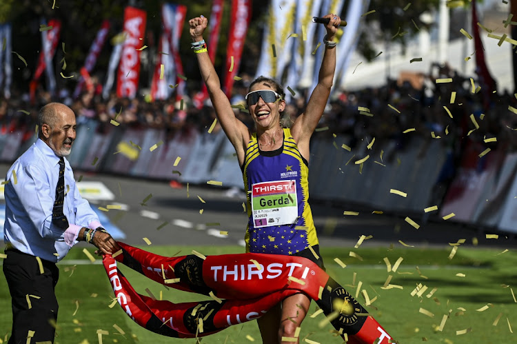 Gerda Steyn Crossing comrades marathon finish line.